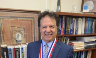 Engineering professor awarded Ellis Island Medal of Honor for antenna work